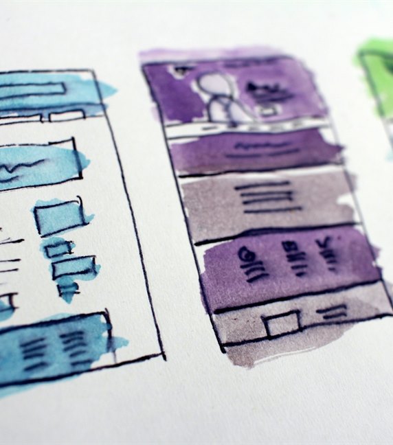 Hand-drawn wireframe sketches of page layouts