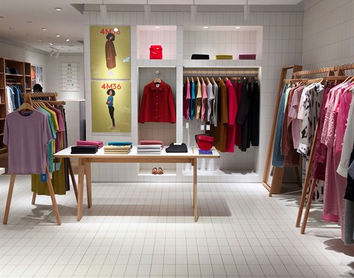 Clothing displayed in a styled boutique